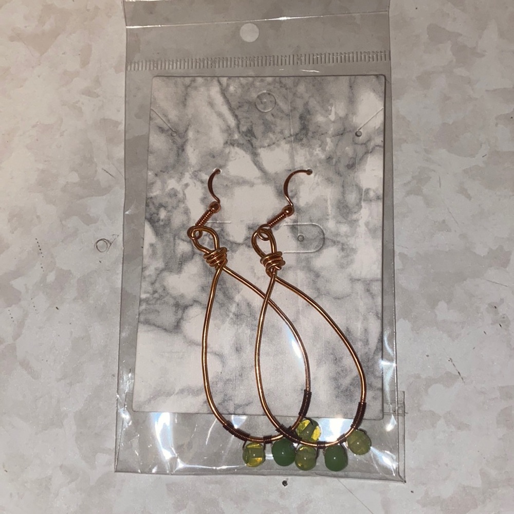 Green dangly earrings